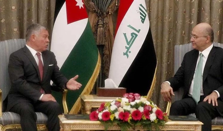 Rey Abdalá II (izquierda) visita a Bagdad y se reuné con el presidente iraquí, Barham Salih.