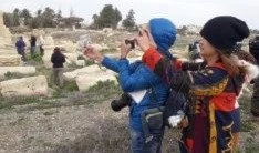 Turistas tailandeses visitan antigua ciudad de Palmira