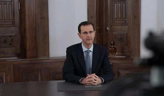 El presidente Bashar al-Assad durante una alocución televisiva en ocasión de las recientes victorias del Ejército sirio. 