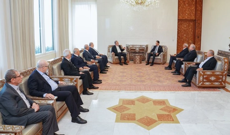 Representantes de las facciones palestinas se reúnen con Al-Assad en Damasco.