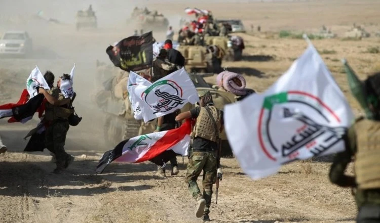 Efectivos de las Fuerzas de Movilización Popular de Irak. Efectivos de las Fuerzas de Movilización Popular de Irak.