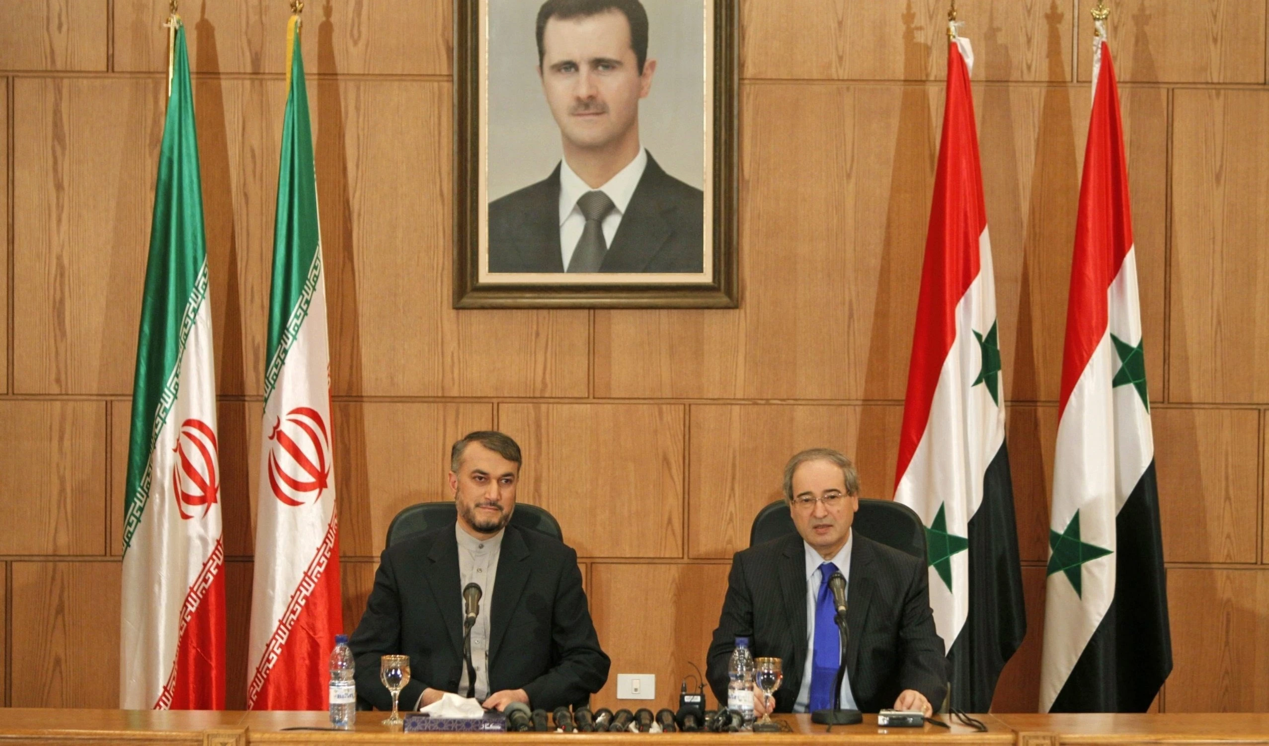 El canciller iraní, Amir Abdullahian y su homólogo sirio, Faisal Al-Miqdad, durante un encuentro en Damasco.