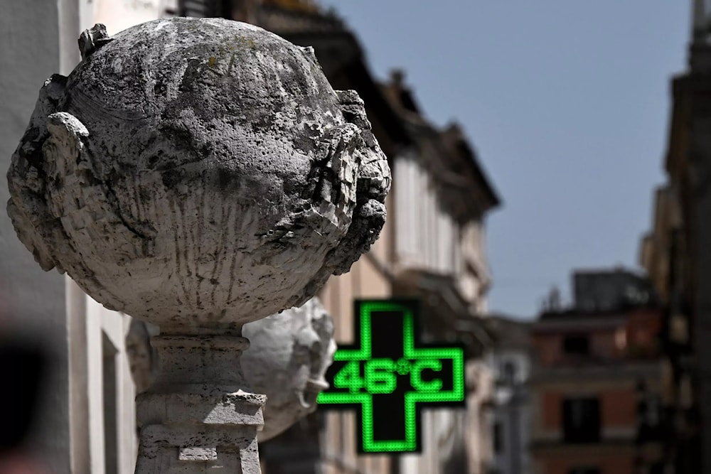 Un termómetro indica una temperatura de 46 grados Celsius en Roma el 18 de julio de 2023. Foto: AFP. 