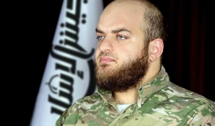 El ciudadano sirio Majdi Nehme, conocido por su nombre de guerra Islam Alloush, es acusado de cometer crímenes de guerra.