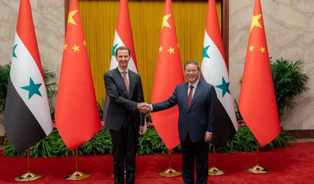 Encuentro entre el presidente de Siria, Bashar al-Assad, y el primer ministro de China,  Li Qiang. Encuentro entre el presidente de Siria, Bashar al-Assad, y el primer ministro de China,  Li Qiang.