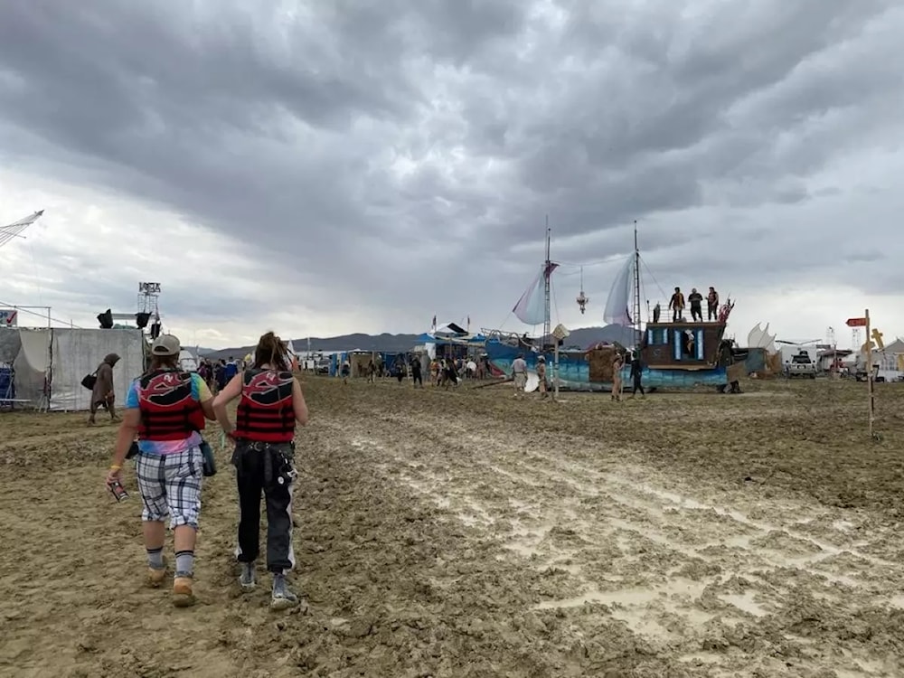 La lluvia provocó agitación en el festival Burning Man, en EE.UU. Foto: AFP. 