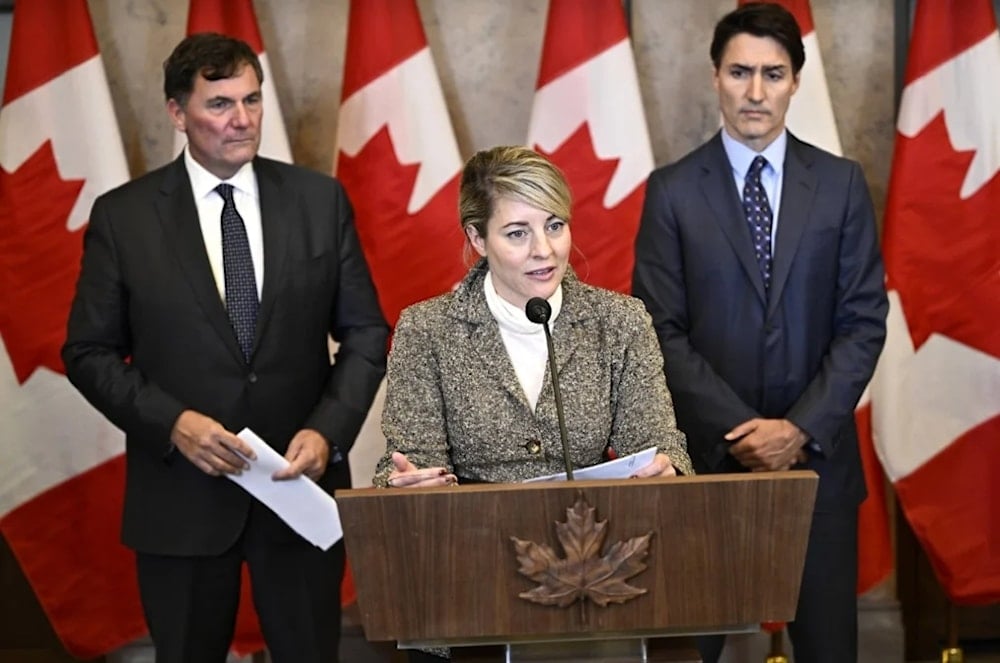 La ministra de Asuntos Exteriores, Melanie Jolie, el titular de Finanzas, Dominique LeBlanc y el primer ministro canadiense, Justin Trudeau. (Foto: Archivo)