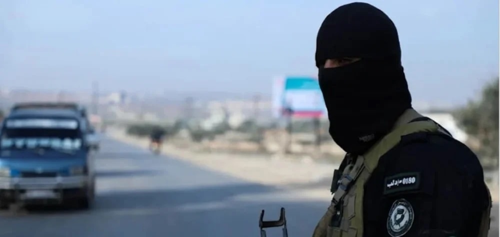 Miembro del equipo de seguridad del grupo terrorista Hayat Tahrir al-Sham.