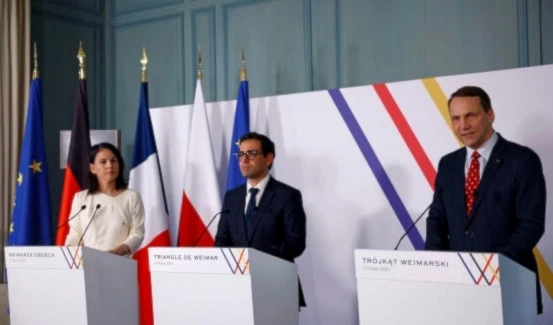 Canciller de Alemania, Francia y Polonia reunidos en París.