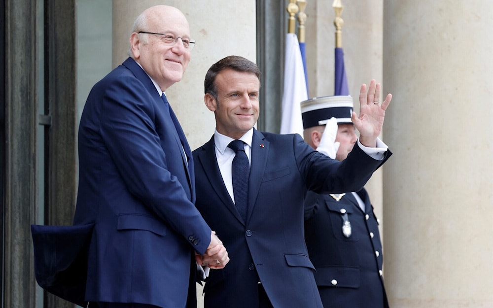 El presidente francés, Emmanuel Macron, recibe al primer ministro interino libanés, Najib Mikati.