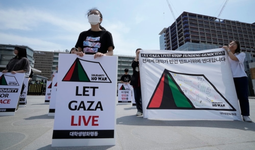 Manifestantes en Corea del Sur protestan contra el genocidio israelí en Gaza.