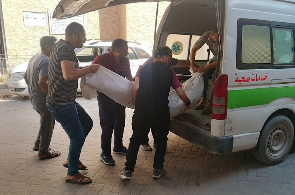 Los equipos de defensa civil recibieron una llamada de socorro acerca de un centro de refugio objetivo de la incursión sionista al oeste de la ciudad de Gaza.