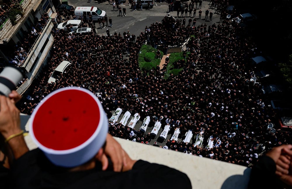 Funeral de los mártires de Majdal Shams en el Golán sirio ocupado. Foto: Reuters