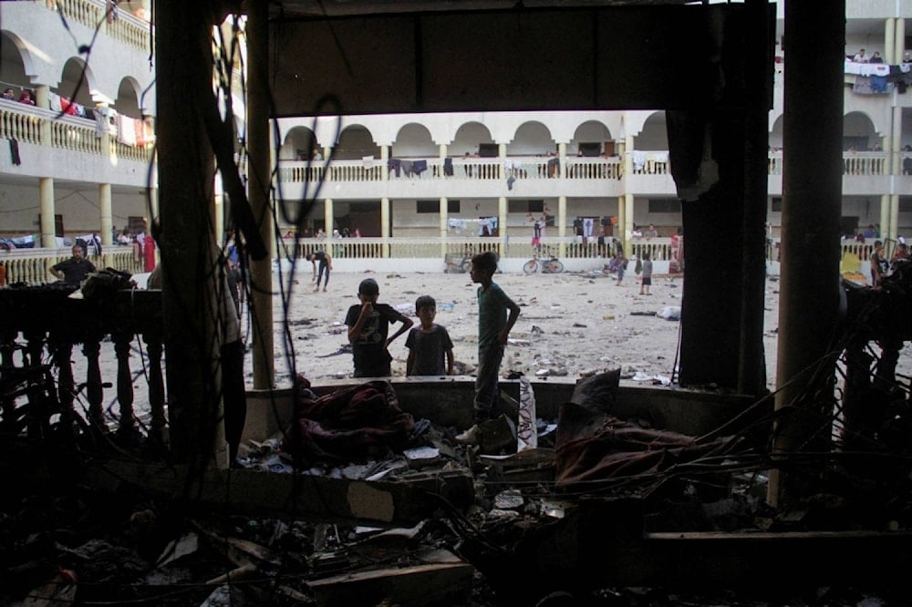 Niños en una escuela bombardeada por la ocupación israelí en la ciudad de Gaza (Agencias)