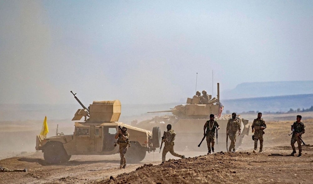 Combatientes de las FDS durante un ejercicio militar conjunto con las fuerzas de la coalición liderada por Estados Unidos, en 2022. (Foto: AFP)