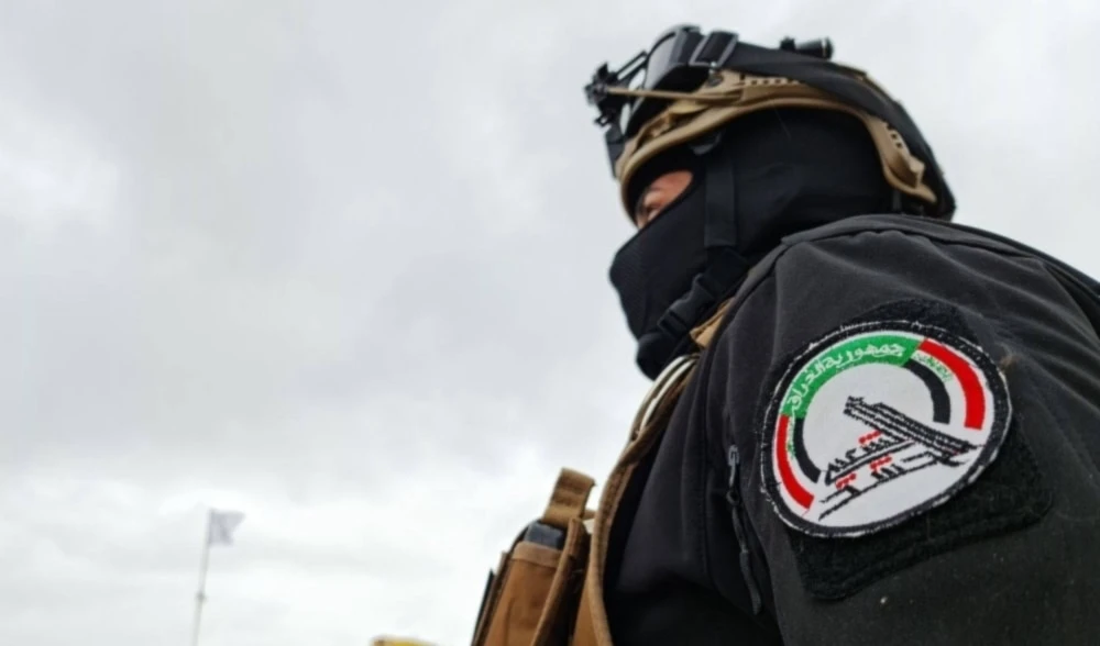 Miembro de las Fuerzas de Movilización Popular de Irak. Miembro de las Fuerzas de Movilización Popular de Irak.