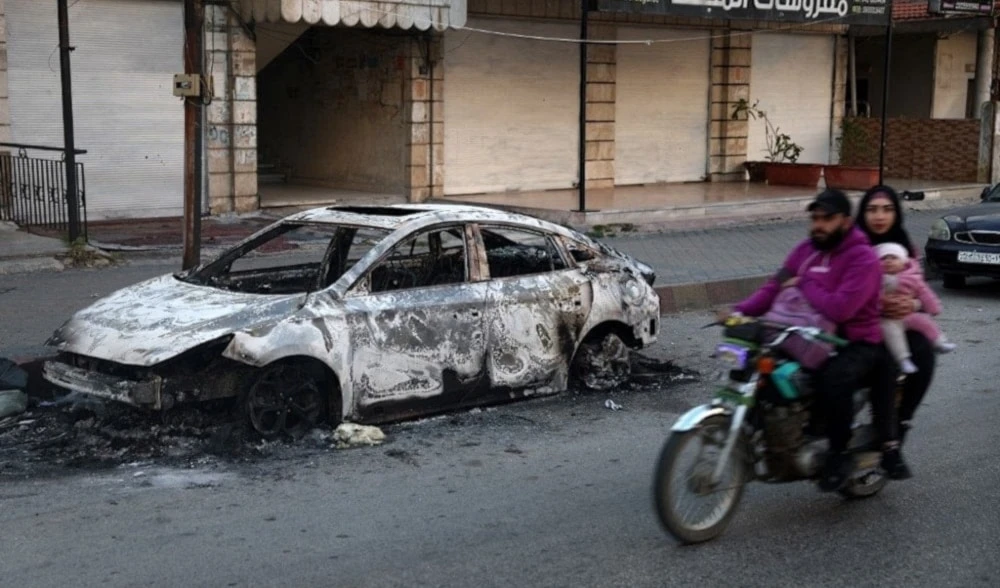 Imágenes de la violencia en la costa siria. (Foto: AFP)