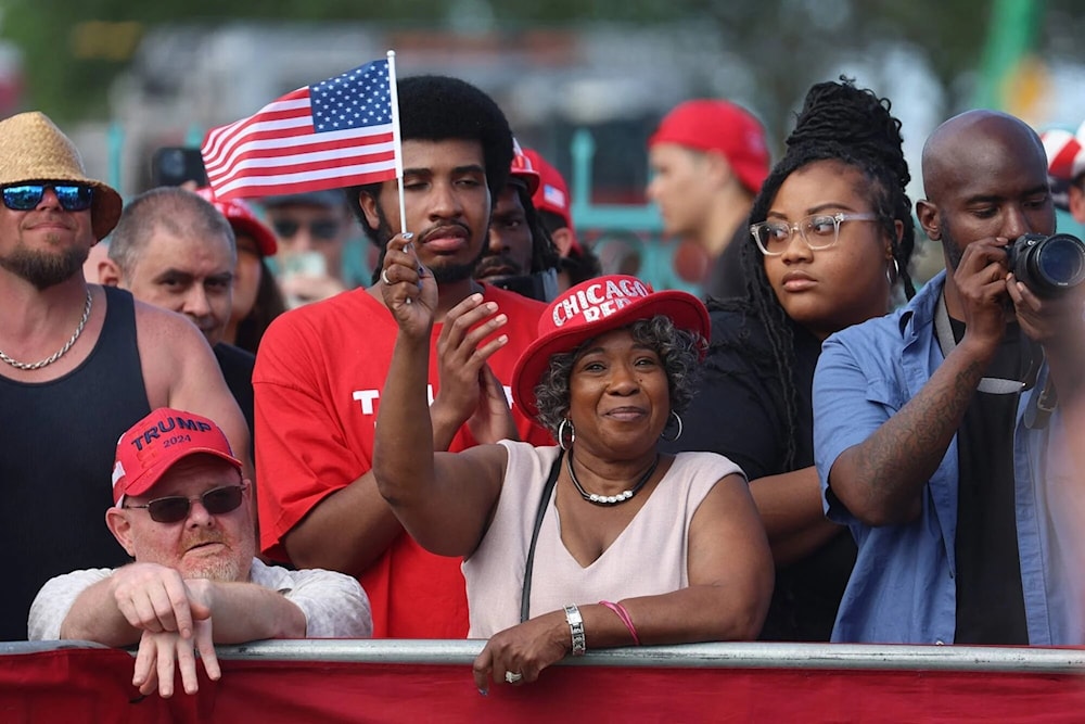 Activistas negros apoyando a Trump en Wisconsin 2024 (Foto: AFP)