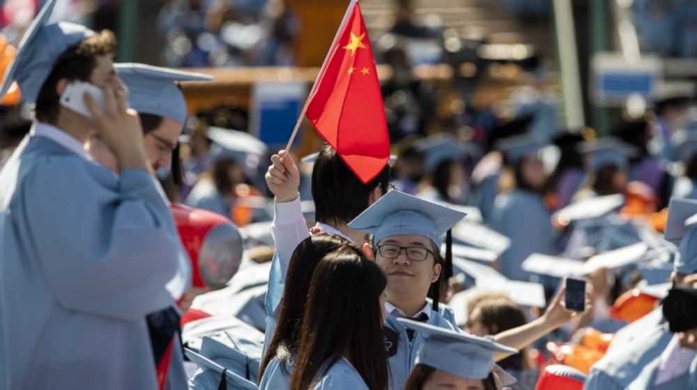 Estudiantes chinos asisten a la ceremonia de graduación en la Universidad de Columbia, Nueva York. Foto: Xinhua